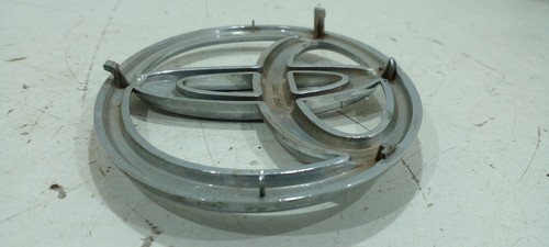 Emblema Grade Dianteira Toyota Hilux 2005/15 753110k050 (r)