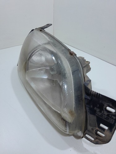 Farol Diant.direito Ford Fiesta 1999/2004 1305235479 (vj)