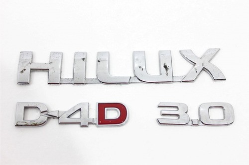 Emblema Logo Porta Jg Hilux 05/15 Usado (991)