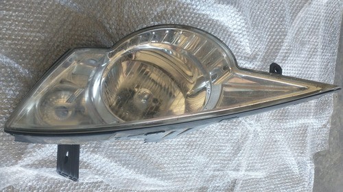 Farol Esquerdo Ssangyong Actyon 2011 2.3 150cv