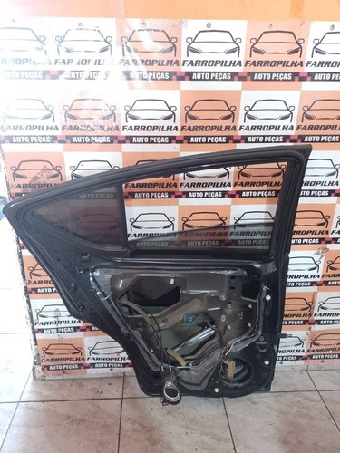 Porta T/e Nissan Versa 13/19