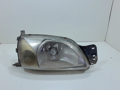 Farol Diant.direito Ford Fiesta 1999/2004 1305235479 (vj)