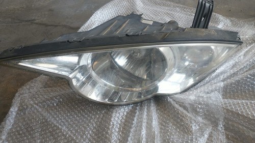 Farol Esquerdo Ssangyong Actyon 2011 2.3 150cv