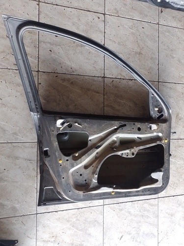 Porta Dianteira L.e Peugeot 206 / 207 4p 2001/2014 C/nf 