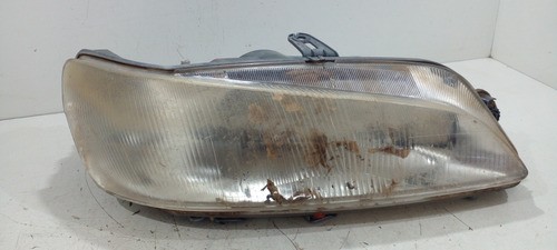 Farol L.d Peugeot 306 94/00 (r)