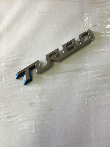 Emblema Original Tampa Tras Tracker Turbo 20/23. 21703*