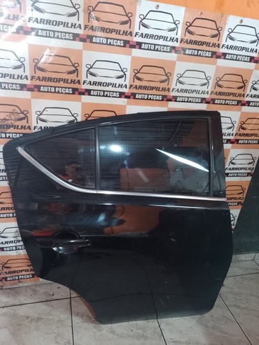 Porta T/d Nissan Versa 13/19