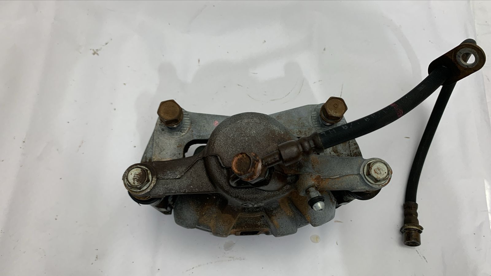 PINÇA FREIO DIANTEIRA ESQUERDA SEM ABS TOYOTA COROLLA XEI 1.8 16V 1998 A 2002