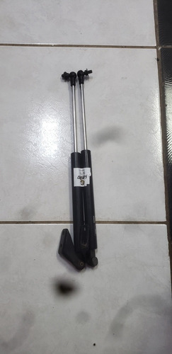 Amortecedor Da Tampa Traseira Nissan Tiida 14915*