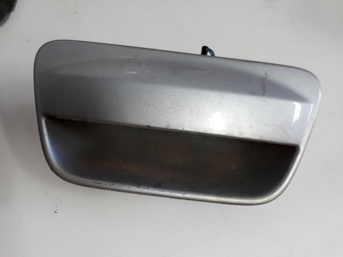 Macaneta Tampa Traseira Nissan Tiida 17800*