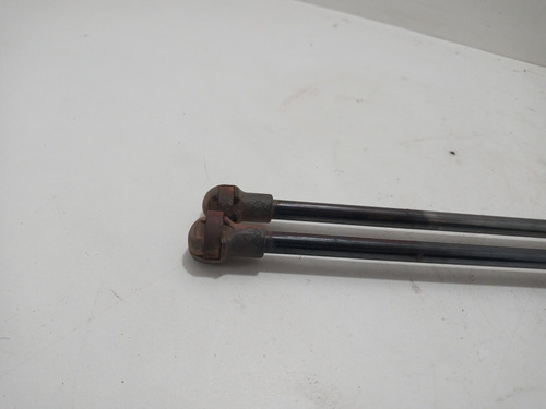 Par/amortecedor Tampa Traseira Vw Golf 1999/2014 Original