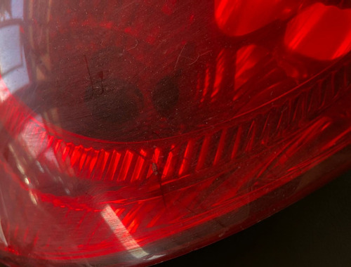 Lanterna Traseira Esquerda Toyota Corolla Xei 03 - C Detalhe