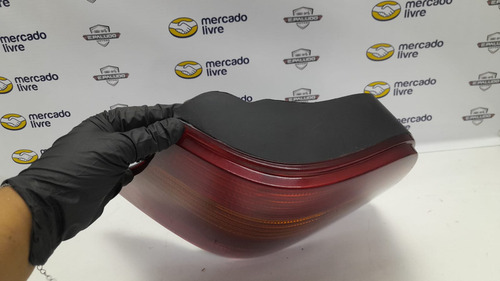 Lanterna Lado Esquerdo Paralela Vw Golf Sapão 99/06 Detalhe